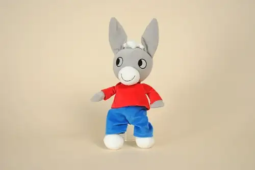 Peluche doudou de l'âne Trotro de 30 cm portant son t-shirt rouge et son pantalon bleu marque vintage Ajena Nounours